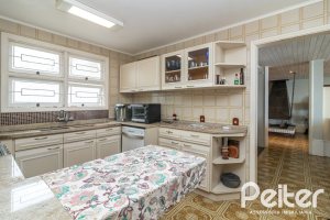 Casa à venda com 389m², 4 dormitórios, 2 suítes, 4 vagas, no bairro Vila Assunção em Porto Alegre