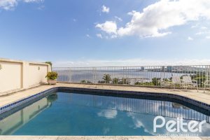 Casa à venda com 389m², 4 dormitórios, 2 suítes, 4 vagas, no bairro Vila Assunção em Porto Alegre