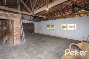 Casa à venda com 169m², 3 dormitórios, 1 suíte, 5 vagas, no bairro Jardim Isabel em Porto Alegre