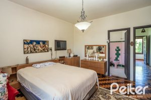 Casa à venda com 169m², 3 dormitórios, 1 suíte, 5 vagas, no bairro Jardim Isabel em Porto Alegre