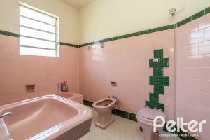 Casa à venda com 169m², 3 dormitórios, 1 suíte, 5 vagas, no bairro Jardim Isabel em Porto Alegre