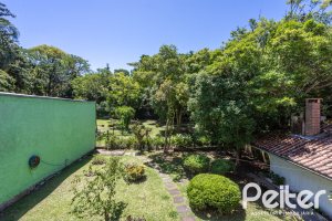 Casa à venda com 169m², 3 dormitórios, 1 suíte, 5 vagas, no bairro Jardim Isabel em Porto Alegre