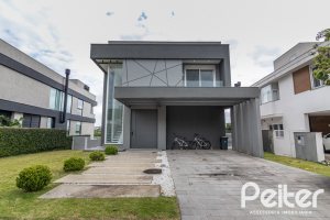 Casa em Condomínio à venda com 309m², 3 dormitórios, 2 suítes, 4 vagas, no bairro Alphaville em PORTO ALEGRE