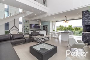 Casa em Condomínio à venda com 309m², 3 dormitórios, 2 suítes, 4 vagas, no bairro Alphaville em PORTO ALEGRE