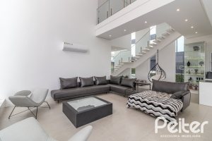 Casa em Condomínio à venda com 309m², 3 dormitórios, 2 suítes, 4 vagas, no bairro Alphaville em PORTO ALEGRE