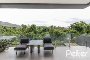 Casa em Condomínio à venda com 309m², 3 dormitórios, 2 suítes, 4 vagas, no bairro Alphaville em PORTO ALEGRE