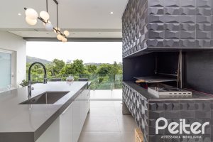 Casa em Condomínio à venda com 309m², 3 dormitórios, 2 suítes, 4 vagas, no bairro Alphaville em PORTO ALEGRE