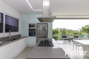 Casa em Condomínio à venda com 309m², 3 dormitórios, 2 suítes, 4 vagas, no bairro Alphaville em PORTO ALEGRE