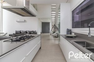 Casa em Condomínio à venda com 309m², 3 dormitórios, 2 suítes, 4 vagas, no bairro Alphaville em PORTO ALEGRE