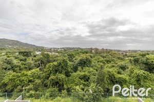 Casa em Condomínio à venda com 309m², 3 dormitórios, 2 suítes, 4 vagas, no bairro Alphaville em PORTO ALEGRE