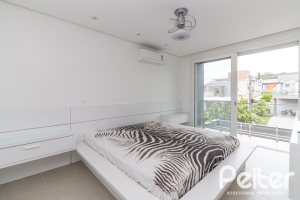 Casa em Condomínio à venda com 309m², 3 dormitórios, 2 suítes, 4 vagas, no bairro Alphaville em PORTO ALEGRE