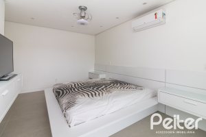 Casa em Condomínio à venda com 309m², 3 dormitórios, 2 suítes, 4 vagas, no bairro Alphaville em PORTO ALEGRE