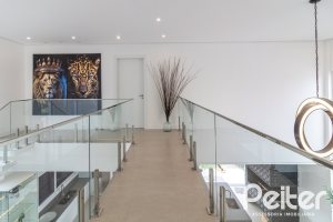 Casa em Condomínio à venda com 309m², 3 dormitórios, 2 suítes, 4 vagas, no bairro Alphaville em PORTO ALEGRE