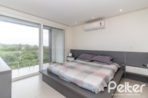 Casa em Condomínio à venda com 309m², 3 dormitórios, 2 suítes, 4 vagas, no bairro Alphaville em PORTO ALEGRE