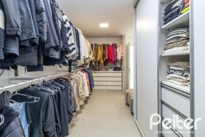 Casa em Condomínio à venda com 309m², 3 dormitórios, 2 suítes, 4 vagas, no bairro Alphaville em PORTO ALEGRE