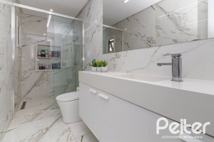 Casa em Condomínio à venda com 309m², 3 dormitórios, 2 suítes, 4 vagas, no bairro Alphaville em PORTO ALEGRE