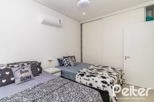 Casa em Condomínio à venda com 309m², 3 dormitórios, 2 suítes, 4 vagas, no bairro Alphaville em PORTO ALEGRE