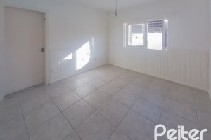Casa à venda com 162m², 3 dormitórios, 1 suíte, 3 vagas, no bairro Guarujá em Porto Alegre