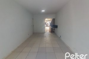 Casa à venda com 162m², 3 dormitórios, 1 suíte, 3 vagas, no bairro Guarujá em Porto Alegre