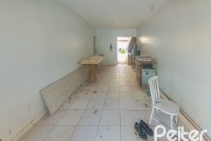 Casa à venda com 162m², 3 dormitórios, 1 suíte, 3 vagas, no bairro Guarujá em Porto Alegre