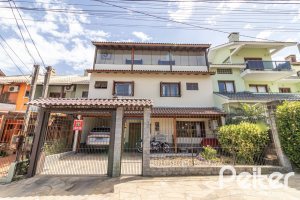 Casa à venda com 300m², 3 dormitórios, 1 suíte, 4 vagas, no bairro Espírito Santo em Porto Alegre