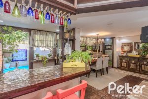 Casa em Condomínio à venda com 220m², 3 dormitórios, 1 suíte, 3 vagas, no bairro Ipanema em Porto Alegre