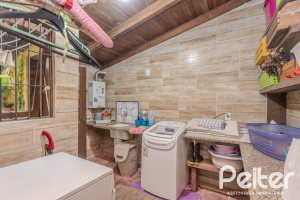 Casa em Condomínio à venda com 220m², 3 dormitórios, 1 suíte, 3 vagas, no bairro Ipanema em Porto Alegre