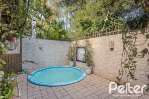 Casa em Condomínio à venda com 220m², 3 dormitórios, 1 suíte, 3 vagas, no bairro Ipanema em Porto Alegre