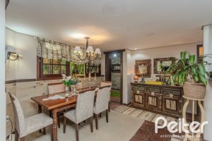 Casa em Condomínio à venda com 220m², 3 dormitórios, 1 suíte, 3 vagas, no bairro Ipanema em Porto Alegre