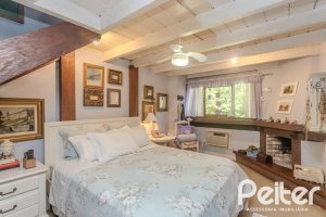 Casa em Condomínio à venda com 220m², 3 dormitórios, 1 suíte, 3 vagas, no bairro Ipanema em Porto Alegre