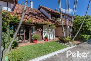 Casa em Condomínio à venda com 220m², 3 dormitórios, 1 suíte, 3 vagas, no bairro Ipanema em Porto Alegre