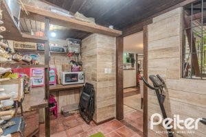 Casa em Condomínio à venda com 220m², 3 dormitórios, 1 suíte, 3 vagas, no bairro Ipanema em Porto Alegre