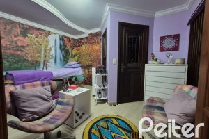 Casa à venda com 357m², 3 dormitórios, 1 suíte, 4 vagas, no bairro Tristeza em Porto Alegre