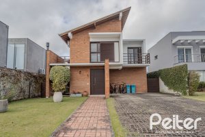 Casa em Condomínio à venda com 336m², 4 dormitórios, 4 suítes, 4 vagas, no bairro Terra Ville em PORTO ALEGRE