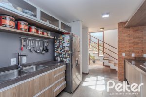 Casa em Condomínio à venda com 336m², 4 dormitórios, 4 suítes, 4 vagas, no bairro Terra Ville em PORTO ALEGRE