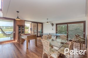 Casa em Condomínio à venda com 336m², 4 dormitórios, 4 suítes, 4 vagas, no bairro Terra Ville em PORTO ALEGRE