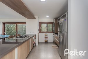 Casa em Condomínio à venda com 336m², 4 dormitórios, 4 suítes, 4 vagas, no bairro Terra Ville em PORTO ALEGRE