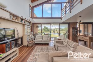 Casa em Condomínio à venda com 336m², 4 dormitórios, 4 suítes, 4 vagas, no bairro Terra Ville em PORTO ALEGRE