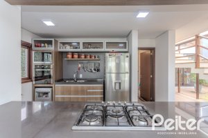 Casa em Condomínio à venda com 336m², 4 dormitórios, 4 suítes, 4 vagas, no bairro Terra Ville em PORTO ALEGRE