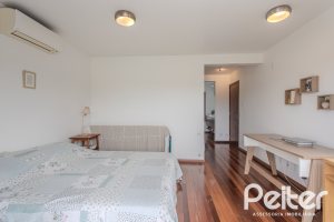 Casa em Condomínio à venda com 336m², 4 dormitórios, 4 suítes, 4 vagas, no bairro Terra Ville em PORTO ALEGRE