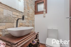 Casa em Condomínio à venda com 336m², 4 dormitórios, 4 suítes, 4 vagas, no bairro Terra Ville em PORTO ALEGRE