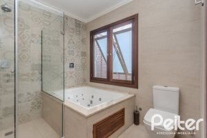 Casa em Condomínio à venda com 336m², 4 dormitórios, 4 suítes, 4 vagas, no bairro Terra Ville em PORTO ALEGRE