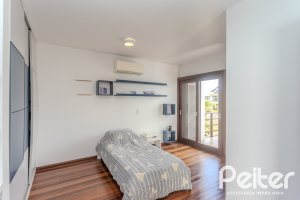 Casa em Condomínio à venda com 336m², 4 dormitórios, 4 suítes, 4 vagas, no bairro Terra Ville em PORTO ALEGRE