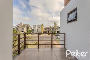 Casa em Condomínio à venda com 336m², 4 dormitórios, 4 suítes, 4 vagas, no bairro Terra Ville em PORTO ALEGRE