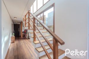Casa em Condomínio à venda com 336m², 4 dormitórios, 4 suítes, 4 vagas, no bairro Terra Ville em PORTO ALEGRE