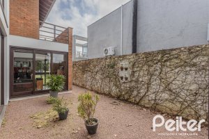 Casa em Condomínio à venda com 336m², 4 dormitórios, 4 suítes, 4 vagas, no bairro Terra Ville em PORTO ALEGRE