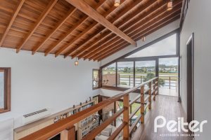 Casa em Condomínio à venda com 336m², 4 dormitórios, 4 suítes, 4 vagas, no bairro Terra Ville em PORTO ALEGRE