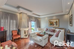 Casa à venda com 265m², 3 dormitórios, 3 suítes, 4 vagas, no bairro Ipanema em Porto Alegre