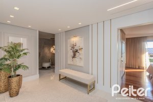 Casa à venda com 265m², 3 dormitórios, 3 suítes, 4 vagas, no bairro Ipanema em Porto Alegre