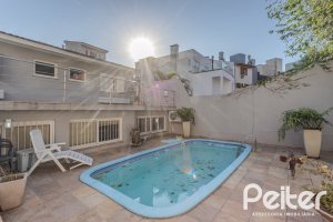 Casa à venda com 265m², 3 dormitórios, 3 suítes, 4 vagas, no bairro Ipanema em Porto Alegre